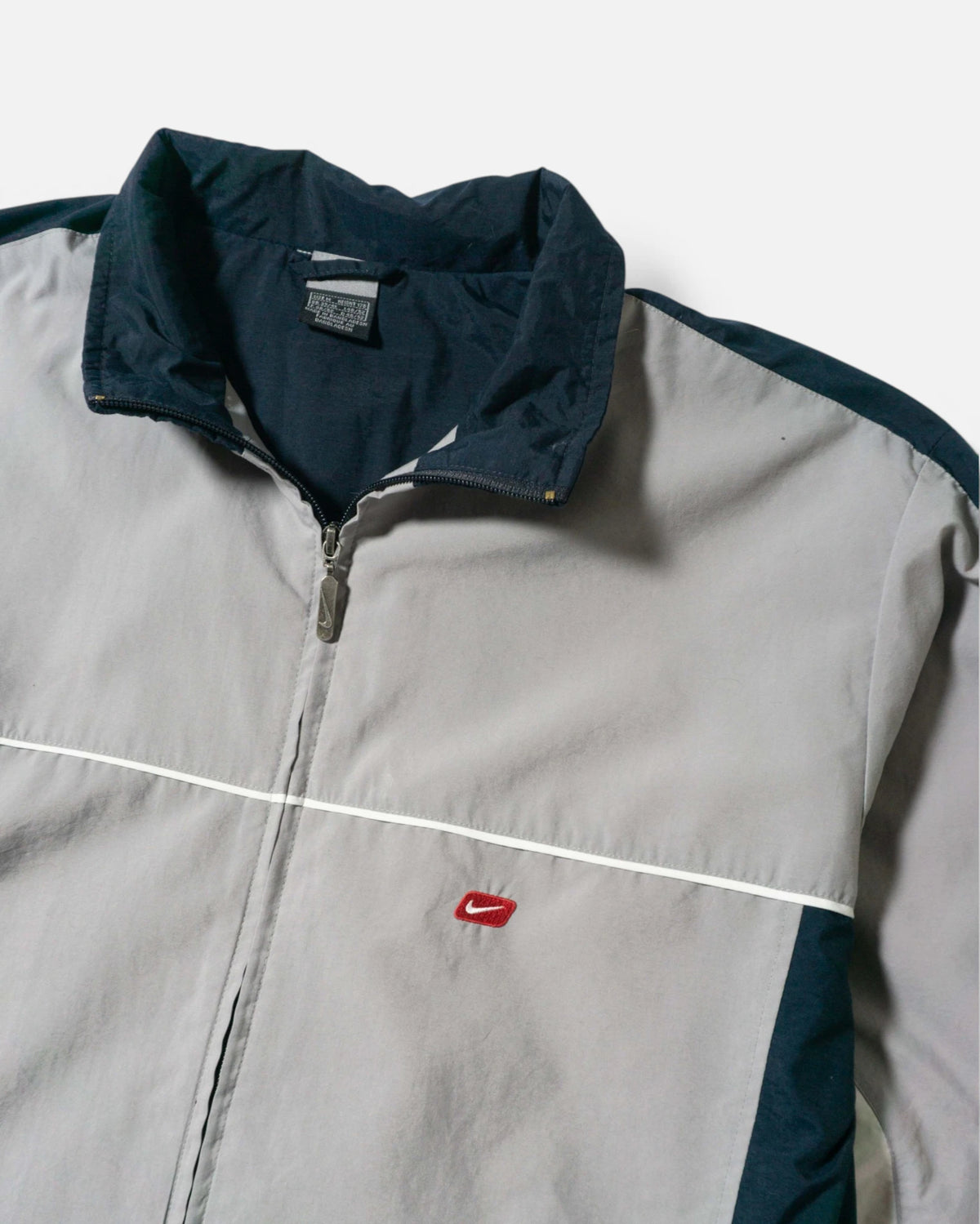 Chaqueta Nike Cortavientos Gris Marina Vintage 00s — Talla M