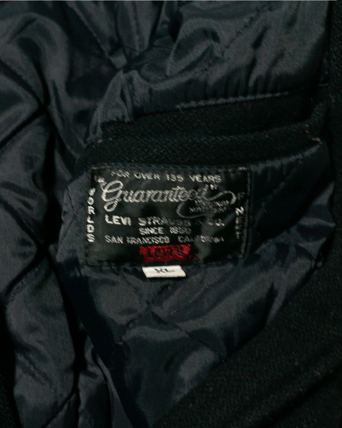 Chaqueta Varsity Levi's Lana Negra Vintage 90s — Talla XL