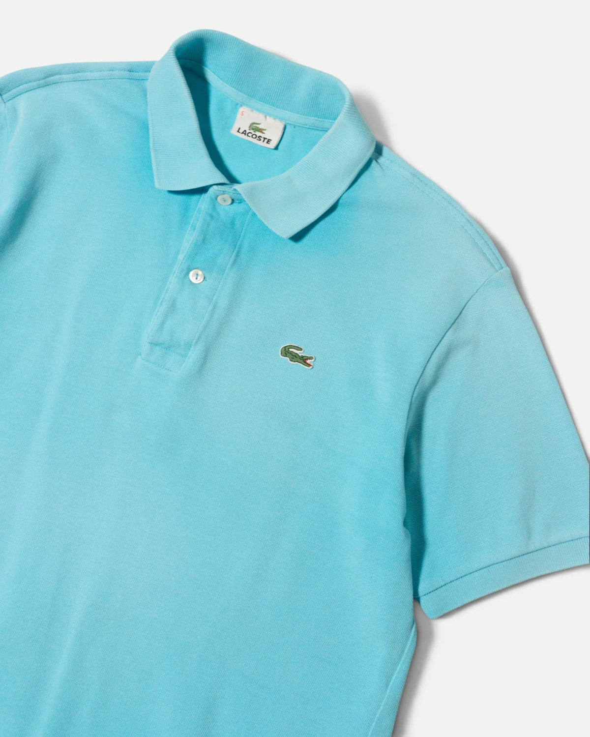 Polo Lacoste Azul Celeste Vintage — Talla S