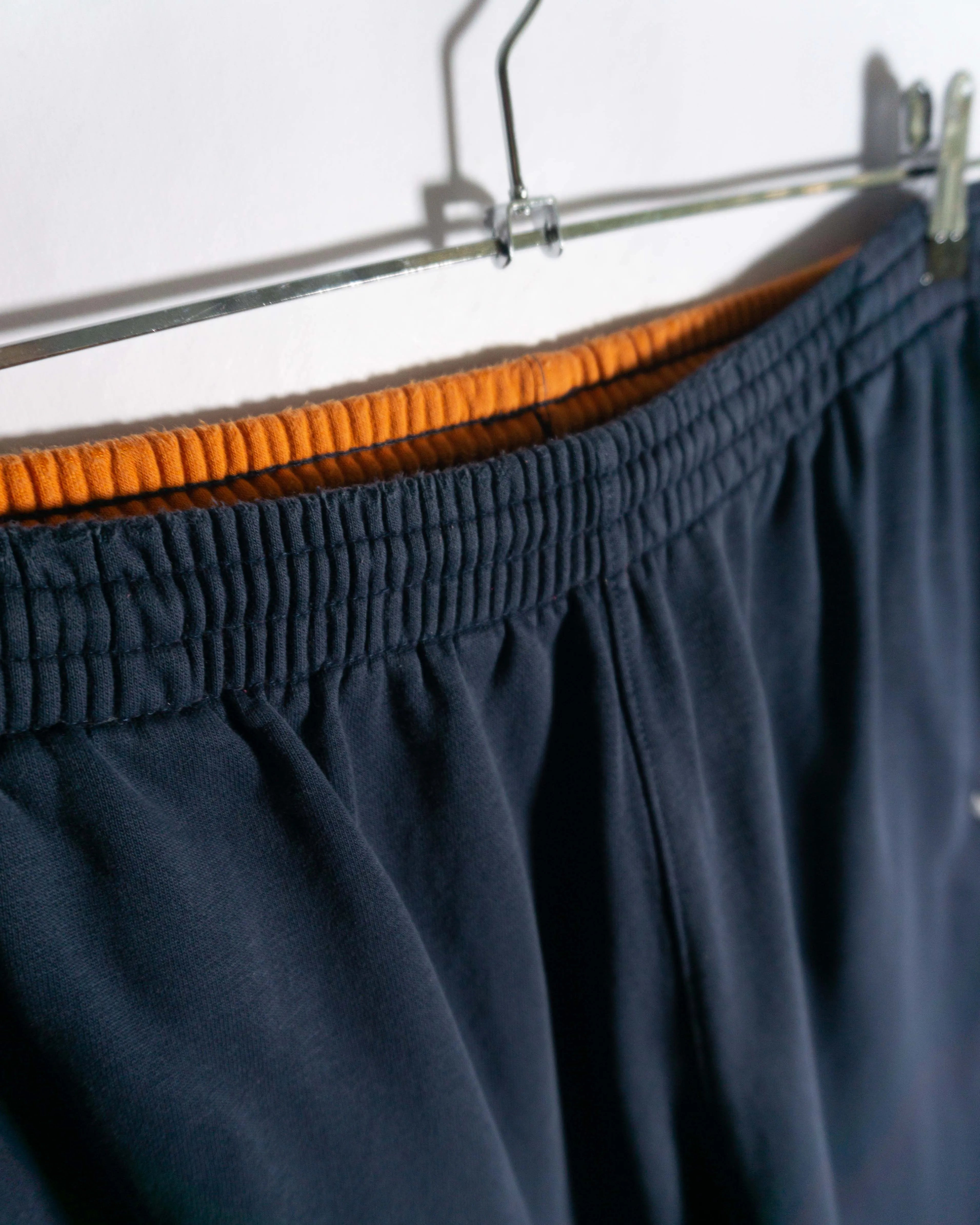 Pantalón deportivo Nike vintage 00s azul marino/naranja S