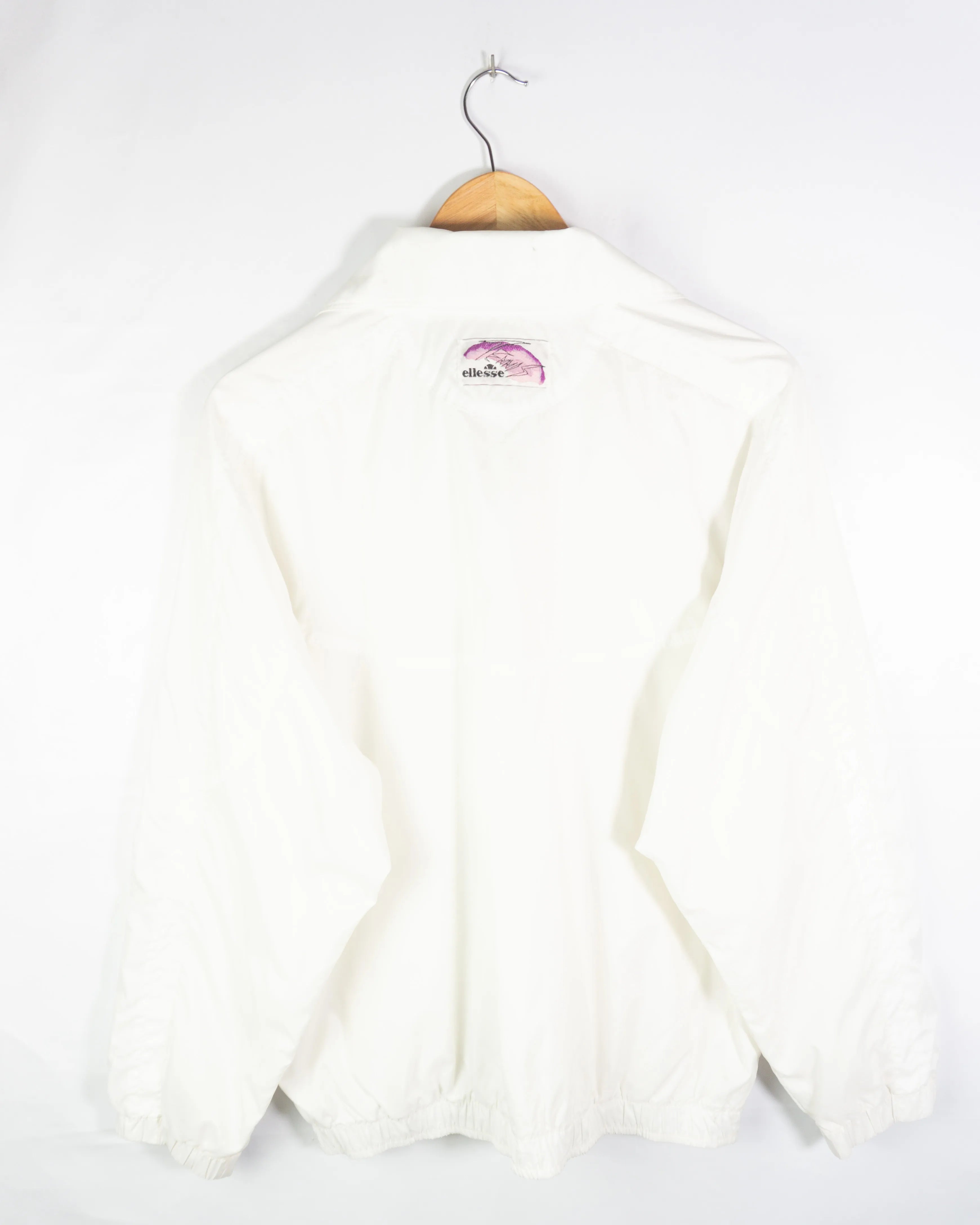 Chaqueta deportiva Ellesse vintage 90s blanca M oversize