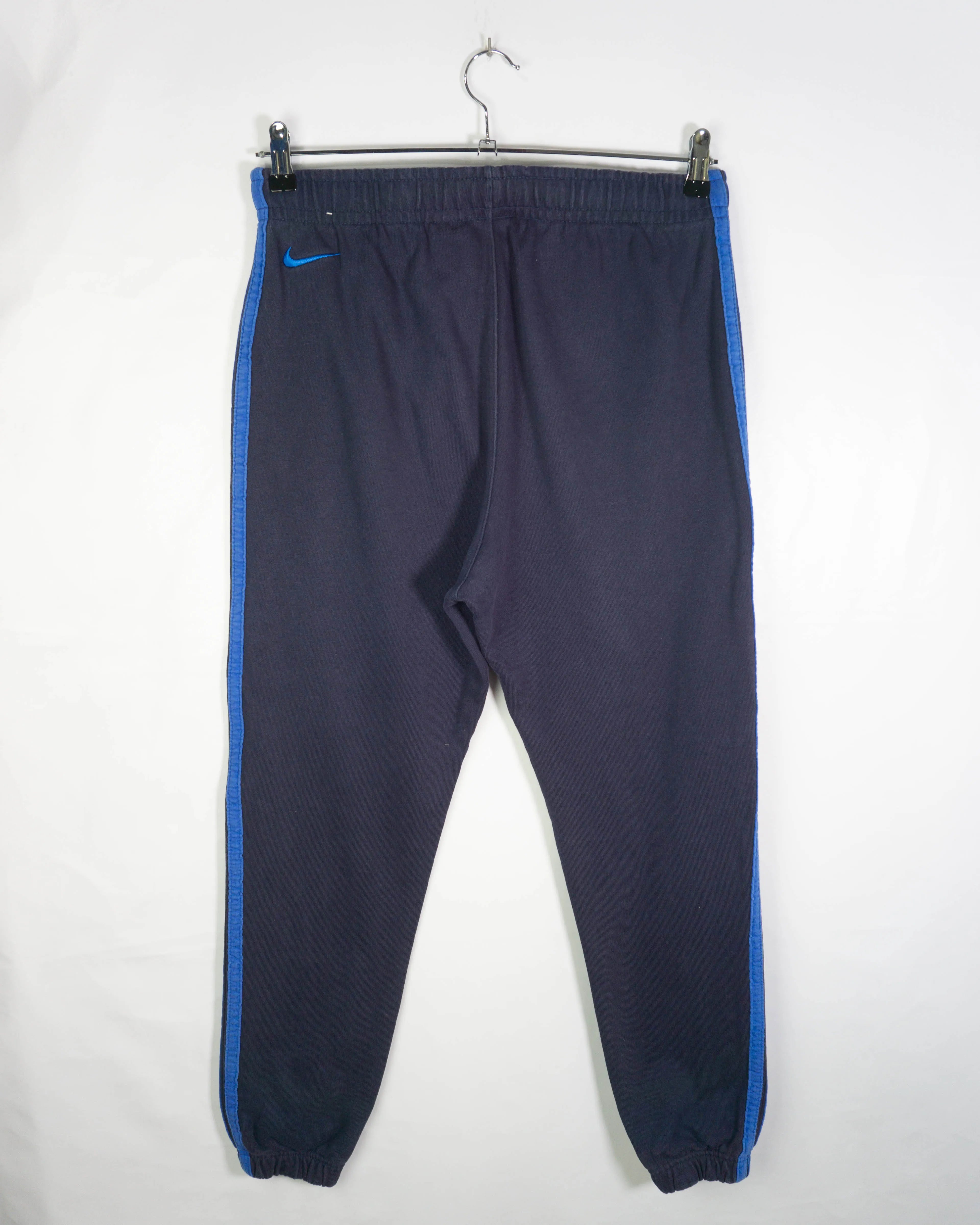 Pantalón deportivo Nike logo universitario azul marino — Talla S