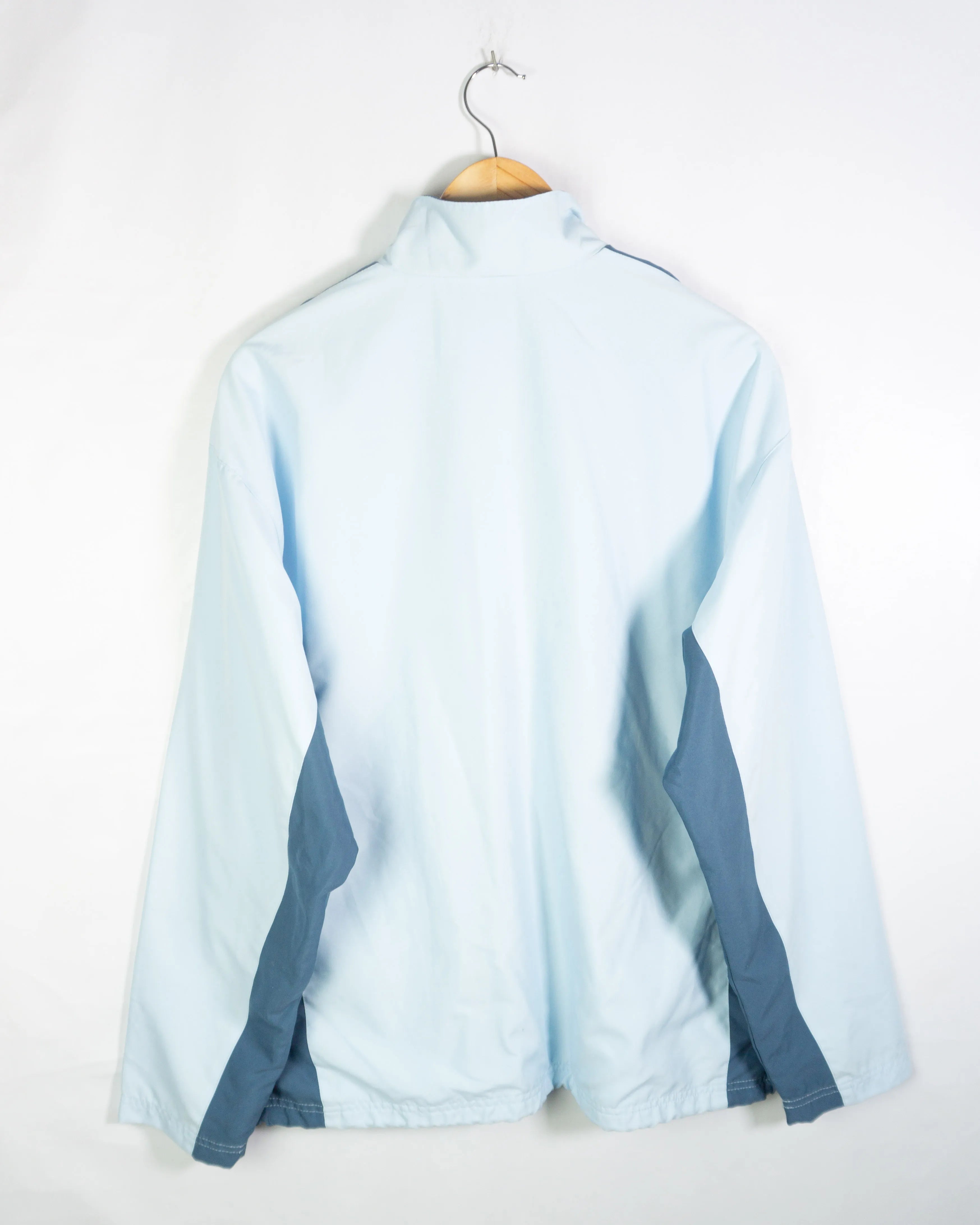 Chaqueta Boomerang Cortavientos Celeste vintage 00s — Talla L