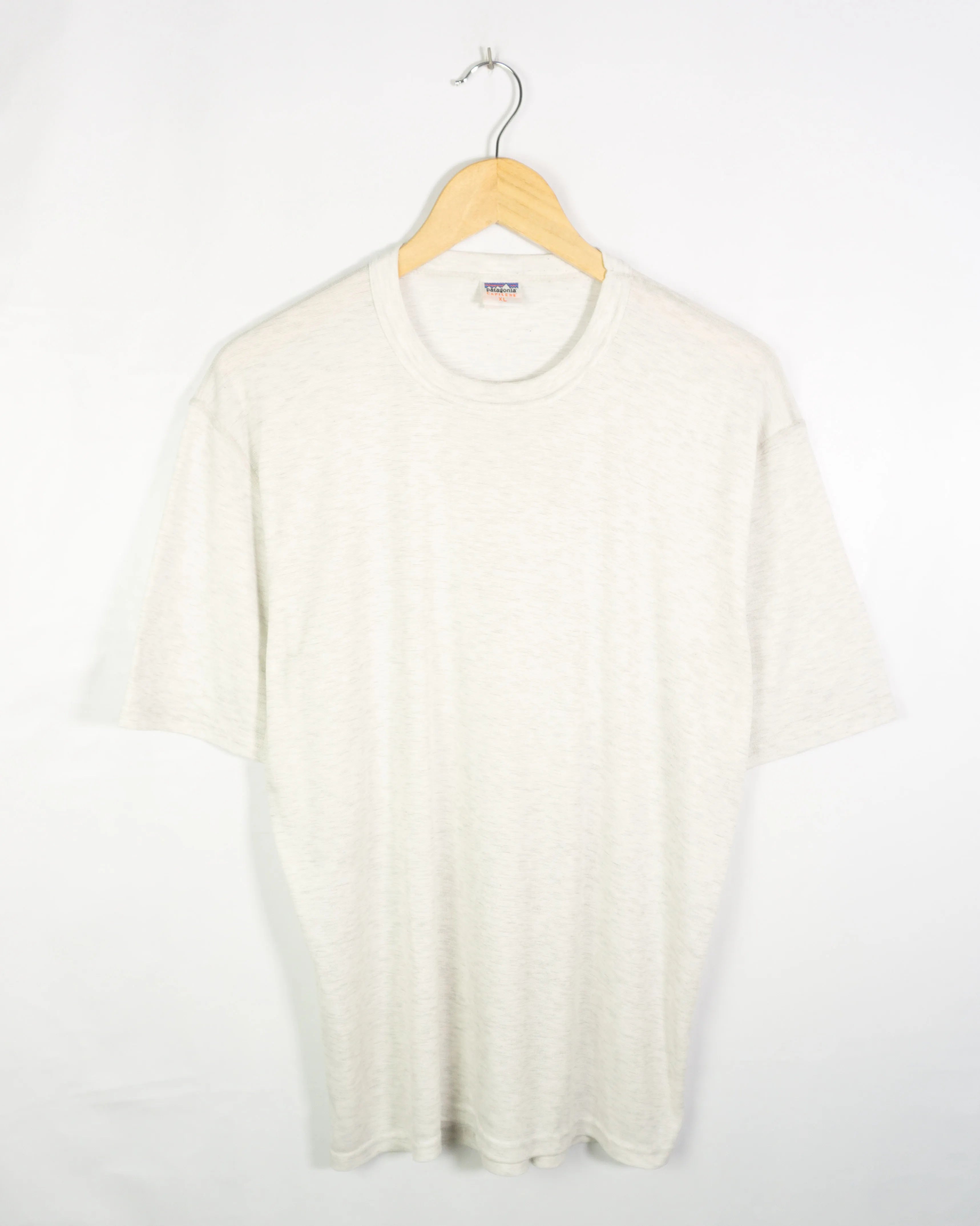 Camiseta Patagonia Capilene Crema Vintage 90s — Talla XL