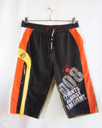 Pantalón Pillo Racing Negro Naranja Vintage Y2K — Talla XL
