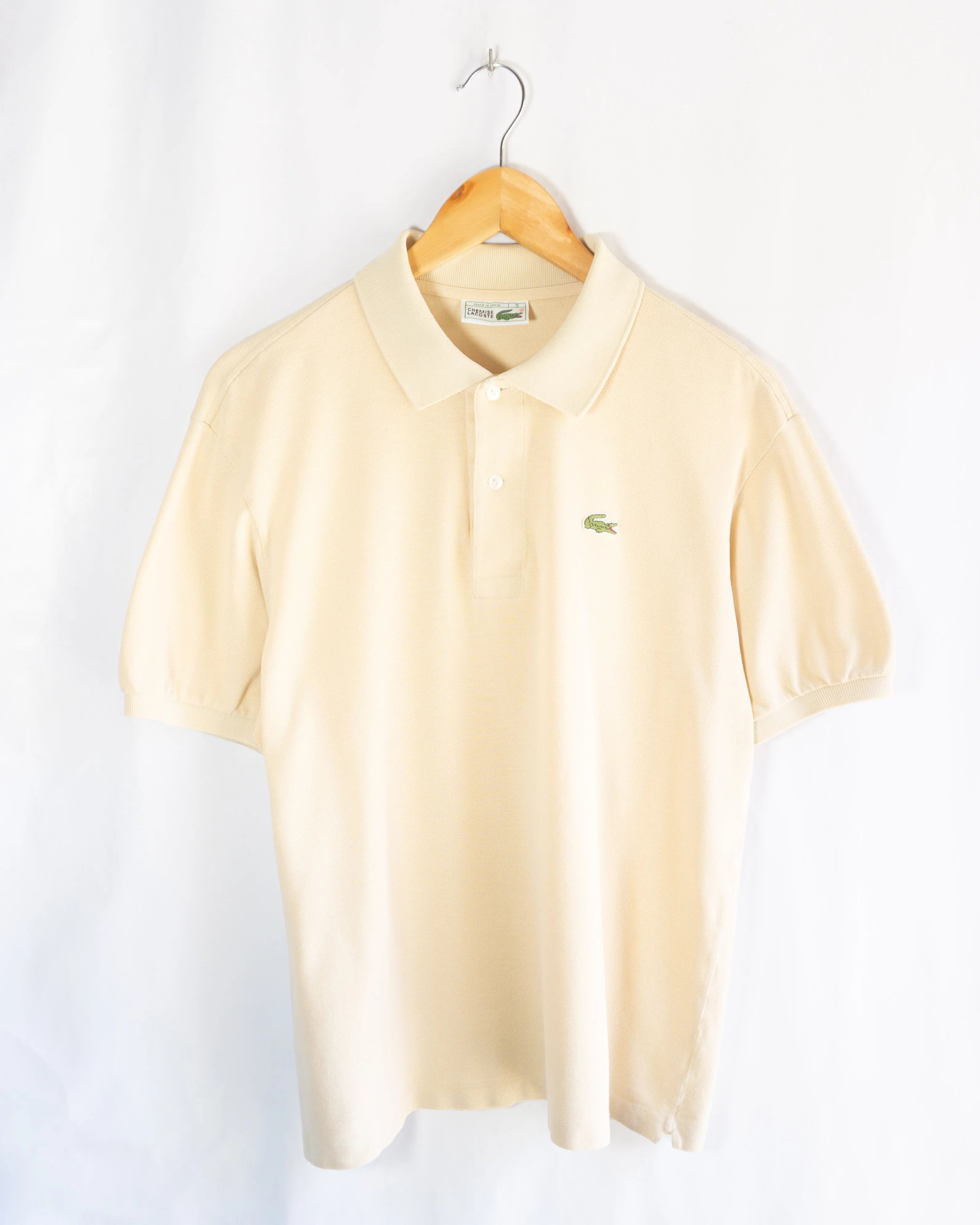 Polo Lacoste Vintage Color Crema — Talla M