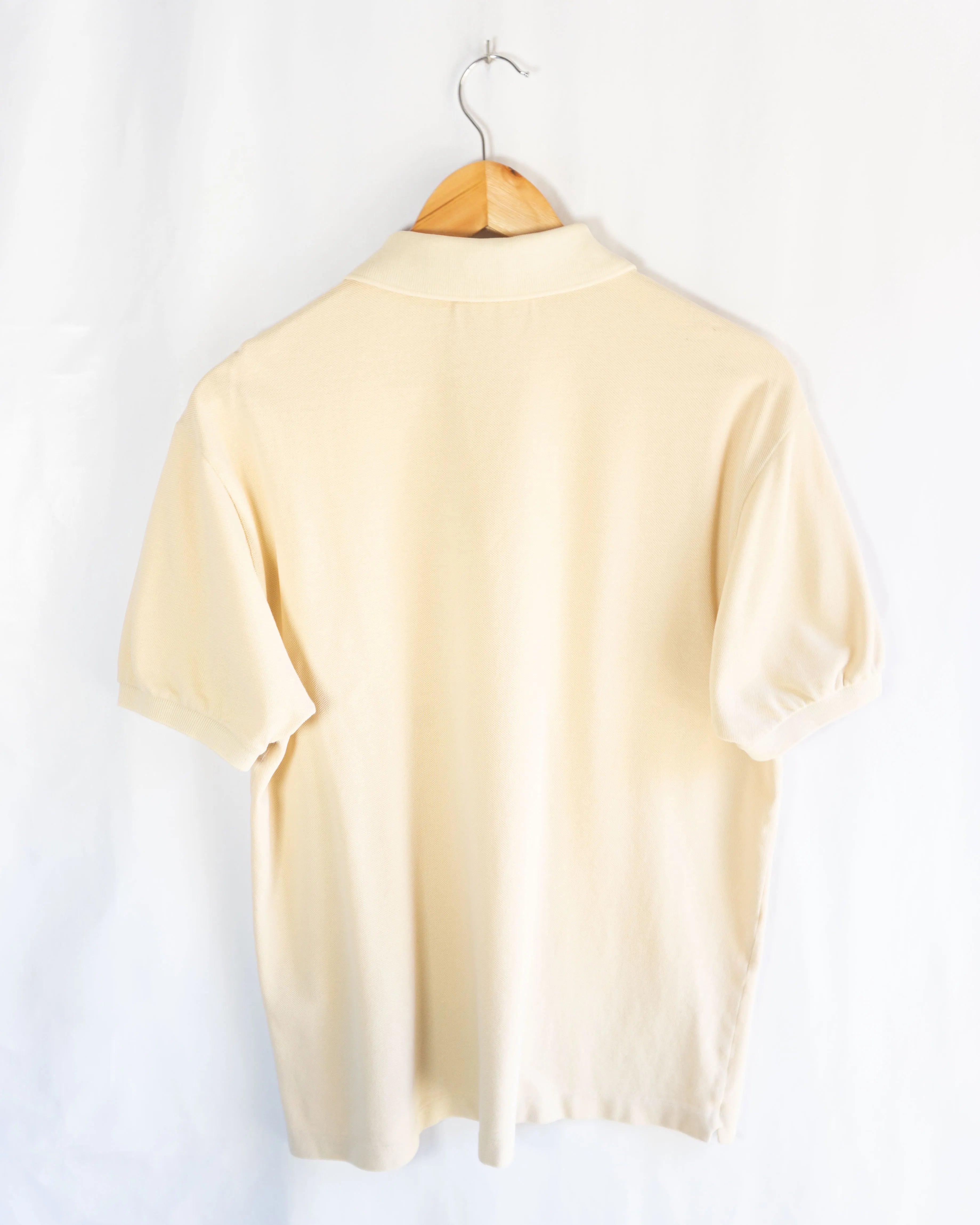 Polo Lacoste Vintage Color Crema — Talla M