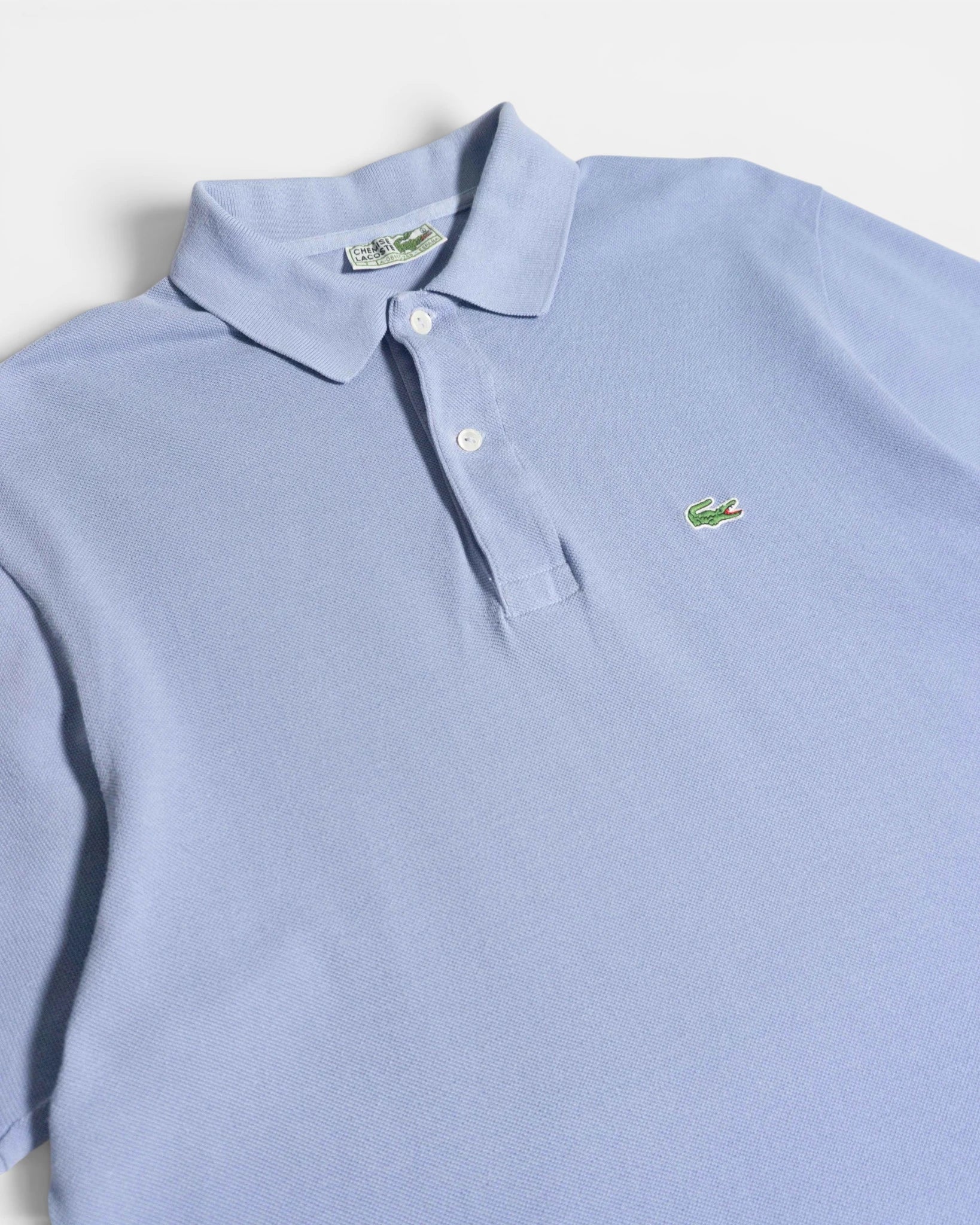Polo Lacoste Vintage Azul Claro  — Talla L